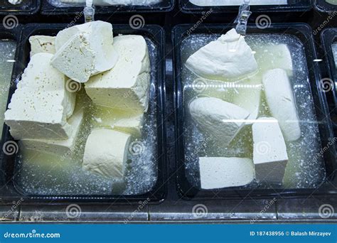 White Cheese Pieces In The Salty Water Stock Photo Image Of