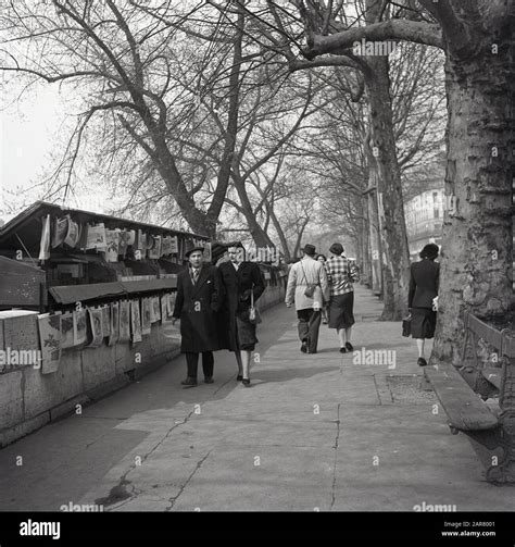 S Historical Couples Walking Along The Pavement On Bank Of The