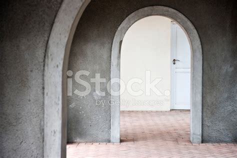 Mysterious Door Seen Through Arches Stock Photo | Royalty-Free | FreeImages