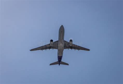 Hawaiian Airlines Flight Taking Off From Boston On A Long Flight To