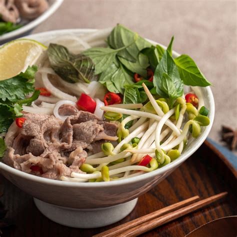 Premium Photo | Delicious vietnamese beef noodles pho with ingredients