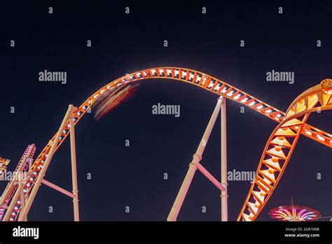 Night Image Of The Thunderbolt Roller Coaster At Luna Parkconey Island