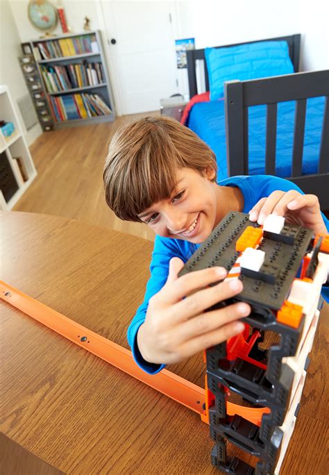 Hot Wheels DWW Track Builder Construction Kit Connectable Loops And Tracks And Mini Toy Car