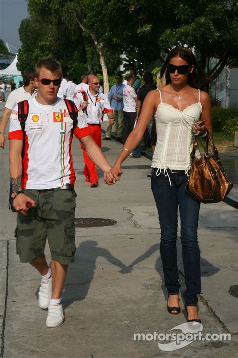 Kimi Raikkonen Scuderia Ferrari and wife Jennie at Malaysian GP