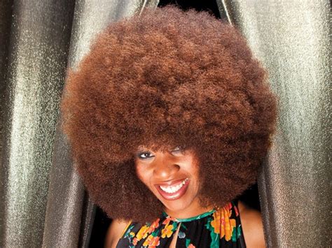 guinness combs world  largest afro  finds napoleonville native