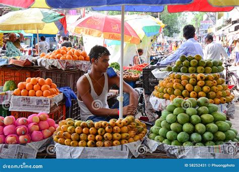 Indian Men Sell Fruits From A Stall In Delhi Editorial Photo Image Of