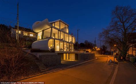 Glass Fronted House Shaped Like A Ribbon Near Lake Zurich With A £5300 A Month Price Tag