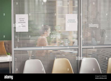 Background Image Of Office Room With Sign Interview In Progress On