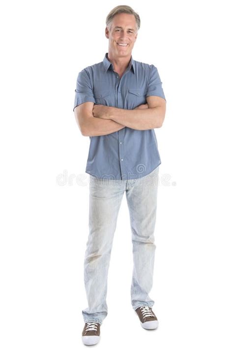 Man Standing Arms Crossed Against White Background. Full length ...