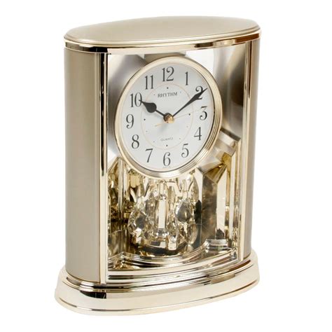 Rhythm Mantel Clock Gold Tone With Rotating Pendulum 4SG724WR18