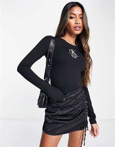 Calvin Klein Jeans Long Sleeve Bodysuit In Black Asos