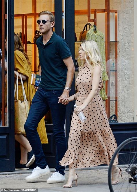Mollie King Looks Elegant In Spotty Nude Pleated Dress As She Holds Hands With Her Love Stuart