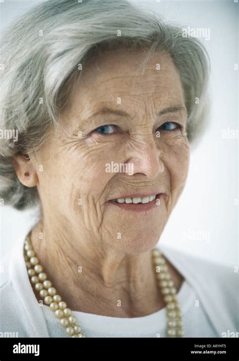 Elderly woman smiling, portrait Stock Photo - Alamy