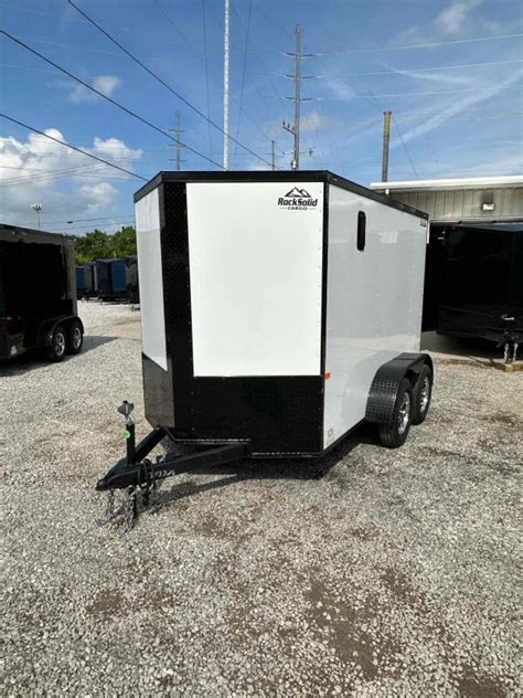 2023 Rock Solid Cargo 6X10 Tandem Axle White Polycore Cargo Enclosed