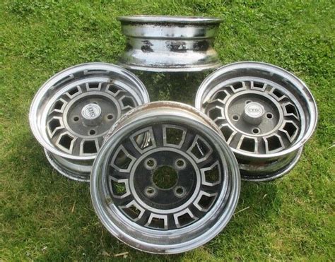 Four Mgb V8 Type Scimitar Gte Dunlop Alloy Steel Composite Wheels