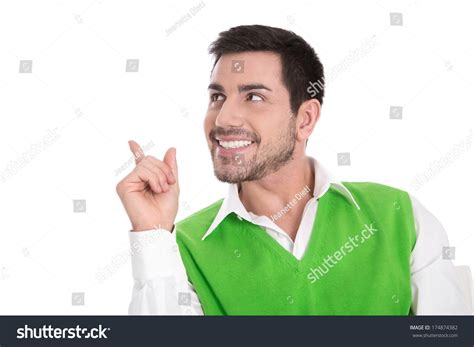 Isolated Business Man Pointing Sneaky Looking Away On White Background