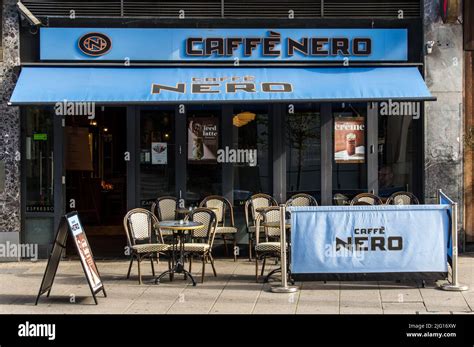 Cafe Nero Coffee Shop Store Front With Tables And Chairs Outside The