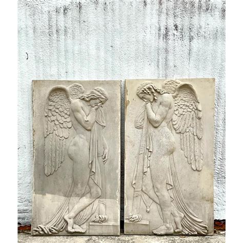 vintage monumental grand  cast stone relief sculptures  pair