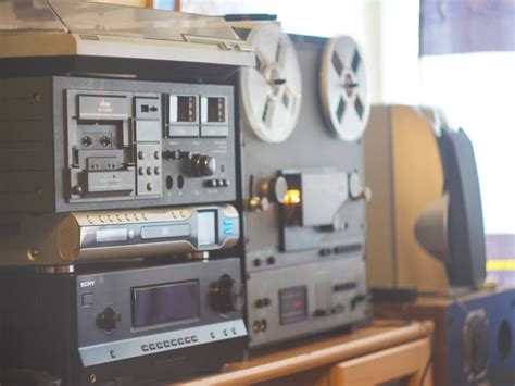 There Are Many Different Types Of Radio Equipment On The Table In Front