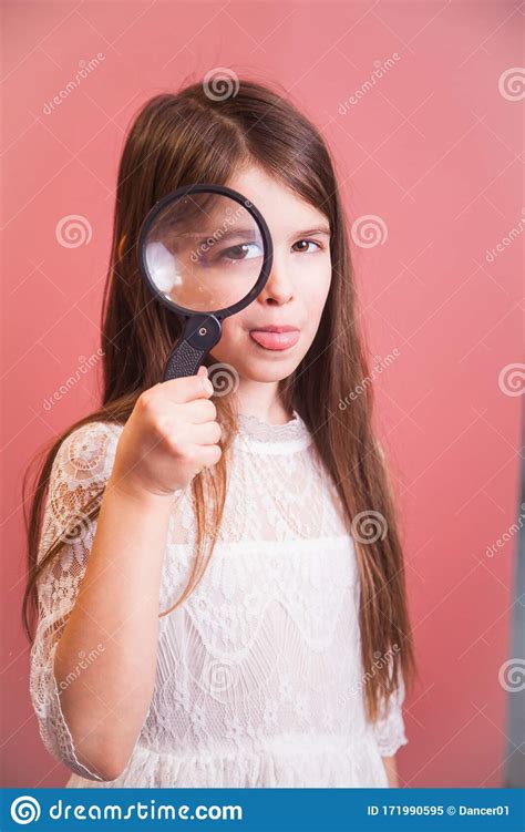 Girl Plays With A Magnifying Glass Stock Image Image Of Ease Emotion