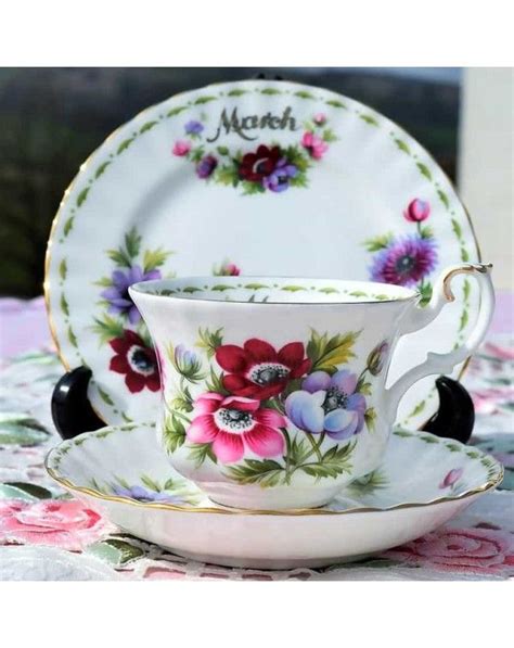 A Tea Cup And Saucer Sitting On Top Of A Table