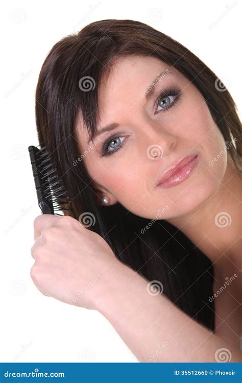 Brunette Brushing Her Hair Stock Photo Image Of Hairbrush