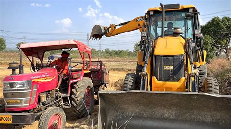 Jcb 3dx Eco Excellence Loading Mud In Mahindra Yuvo Tractor Trolley