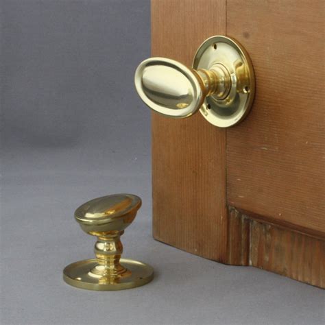 Edwardian Brass Oval Door Knobs Architectural Decor