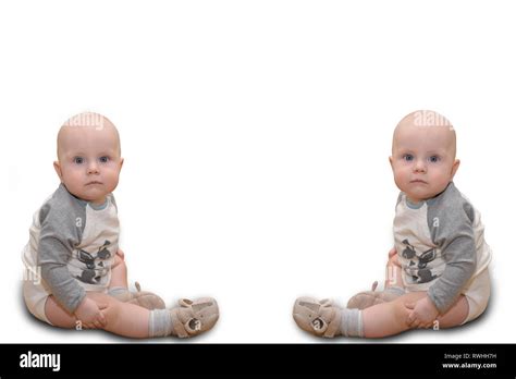 Beautiful Cute Happy Caucasian Baby Twins Infant Sitting Or Crowling