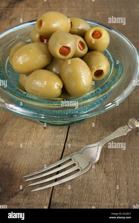 Pimento Stuffed Olives In An Antique Glass Dish Stock Photo Alamy