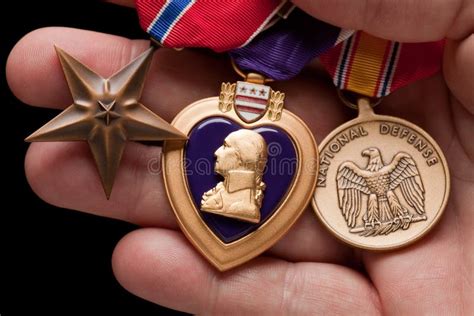 Purple Heart War Medal On Camouflage Material Stock Image Image Of