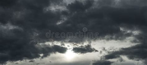 Threatening Dark Clouds Almost Covering The Entire Sky Stock Photo