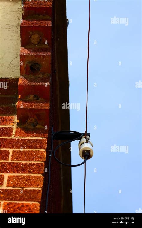 Amateur Radio Long Wire HF Dipole Antenna And Balun Fixed To The Side