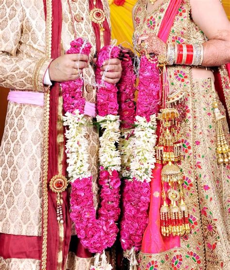 Premium Photo The Bride And Groom At The Indian Wedding Garlands Or Jaimala Ceremony