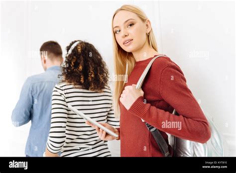 Attractive Longhaired Blonde Posing On Camera Stock Photo Alamy