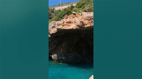 daring dive high octane plunge   meter cliff short shorts