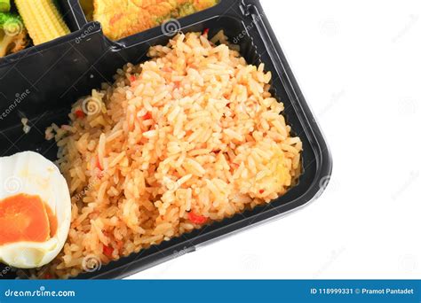 Close Up Fried Rice With Egg And Vegetables In Lunch Box Set On White Background Stock Image