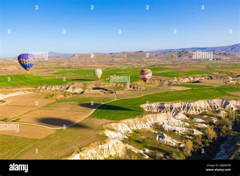 Colorful Hot Air Balloons Over Cappadocia A Semi Arid Region In Central