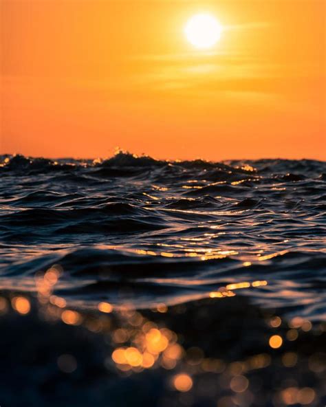 Waves at sunset 1266806 Stock Photo at Vecteezy