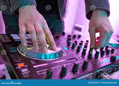 DJ Plays and Mix Music on Digital Midi Mixer Controller. Stock Photo ...