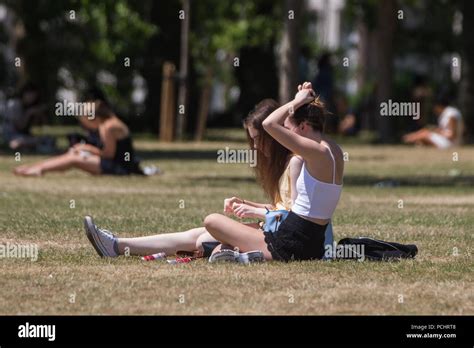 Londoners Enjoy The Hot Weather In London S Green Park Featuring Atmosphere View Where