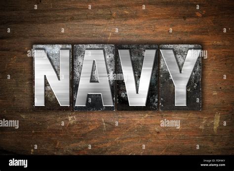 The Word Navy Written In Vintage Metal Letterpress Type On An Aged