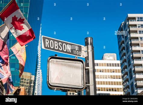 Robson Street Street Name Sign Robson Street Is A Famous Shopping Street In Downtown Vancouver