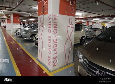 Malaysia shopping mall parking lot for ladies only Stock Photo - Alamy