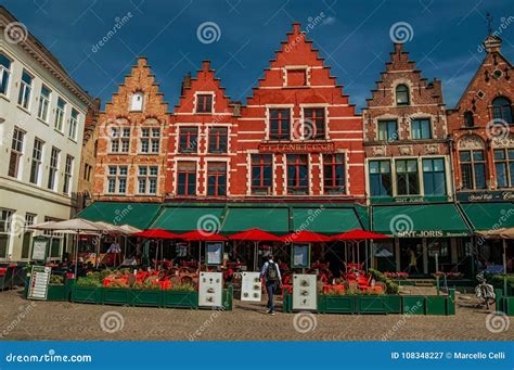 Building and Eateries at the Market Square in Bruges. Editorial ...