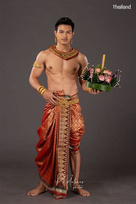 THAI GUY IN TRADITIONAL OUTFIT And LOY KRATHONG FESTIVAL THAILAND