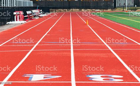 Red Track Looking From Finish Line To 100 Meter Start Line Stock Photo