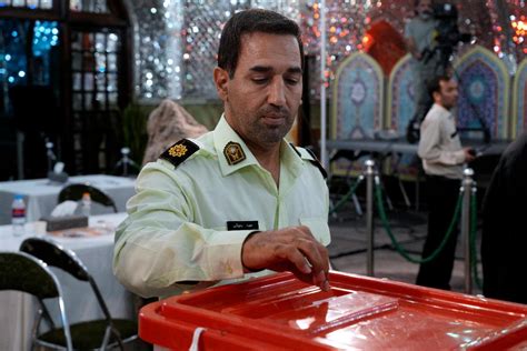 Iran Holds Runoff Presidential Vote Pitting Hard Liner Against