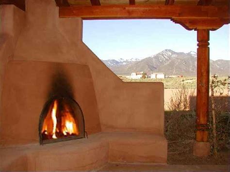 Burning Kiva Fireplace On The Back Porch Southwestern Home Southwest Decor Southwest Style