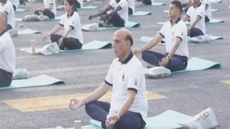 International Yoga Day Rajnath Singh Performs Yoga Onboard Ins Vikrant